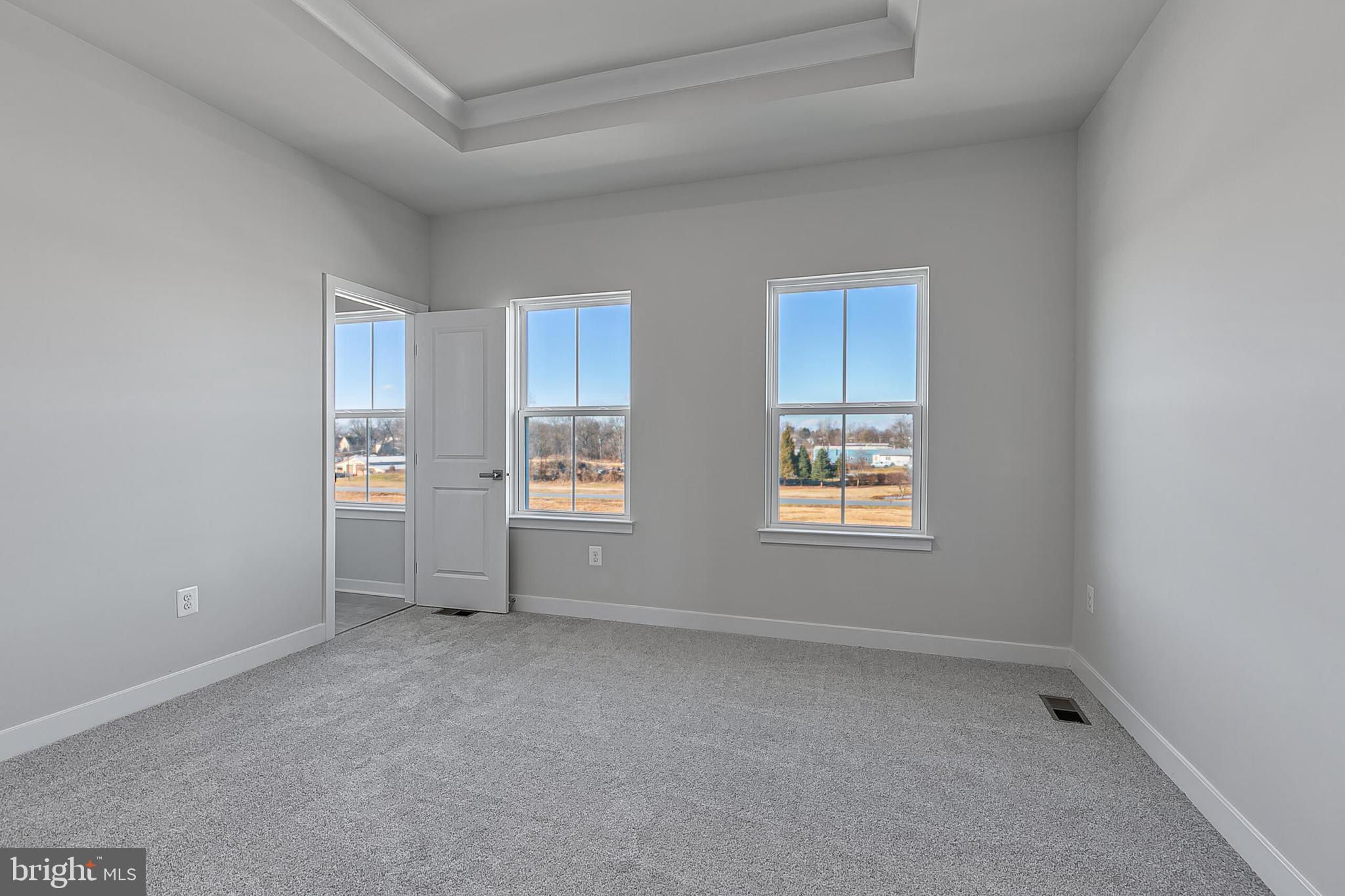 70 C Oasis Avenue Ranson, WV 25438 - Photo 35 of 41 an empty room with windows