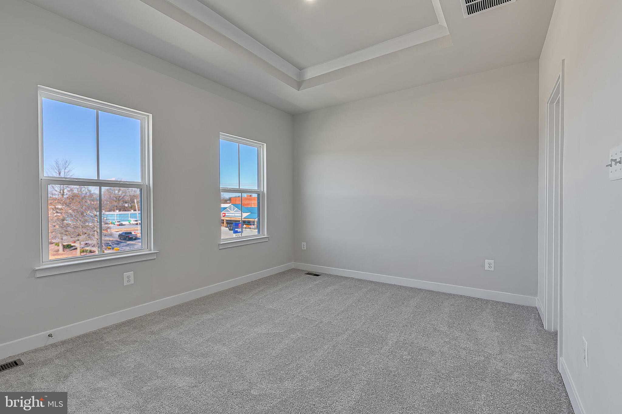 70 C Oasis Avenue Ranson, WV 25438 - Photo 37 of 41 an empty room with windows