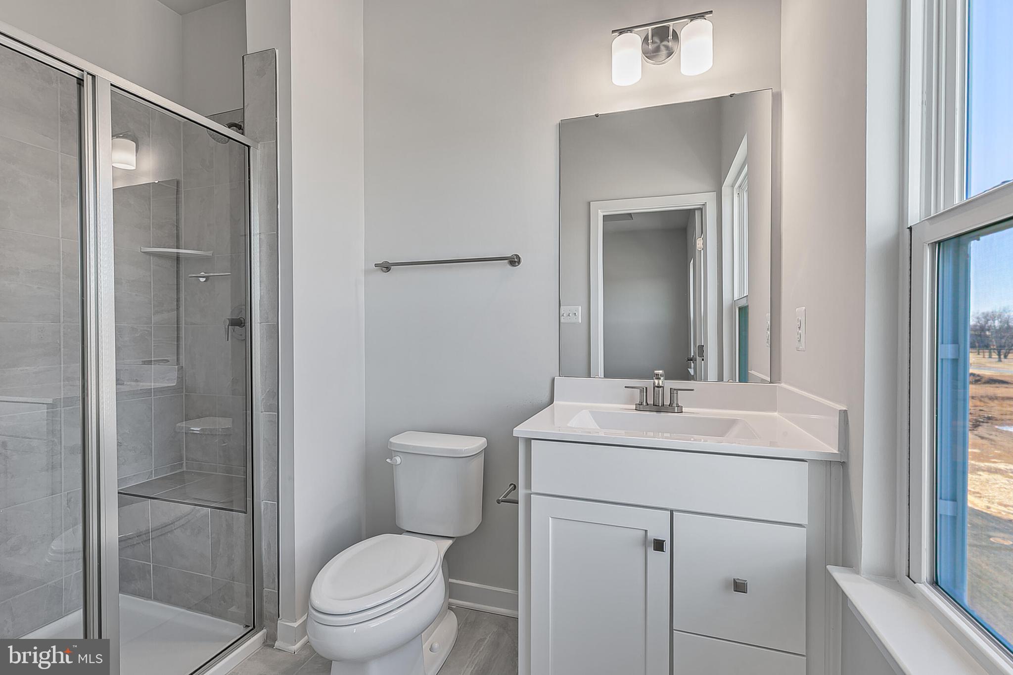 70 C Oasis Avenue Ranson, WV 25438 - Photo 39 of 41 a bathroom with a sink toilet and shower