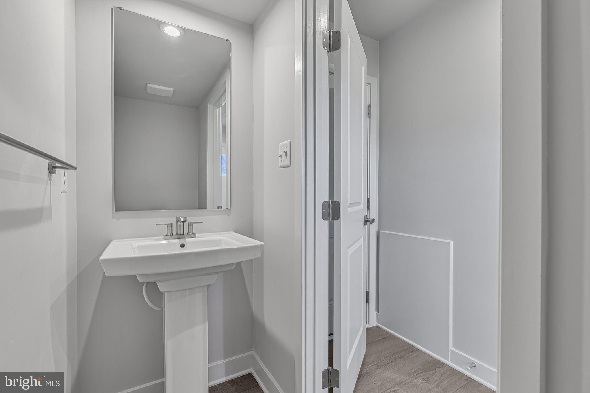 70 C Oasis Avenue Ranson, WV 25438 - Photo 6 of 41 a bathroom with a sink and a mirror