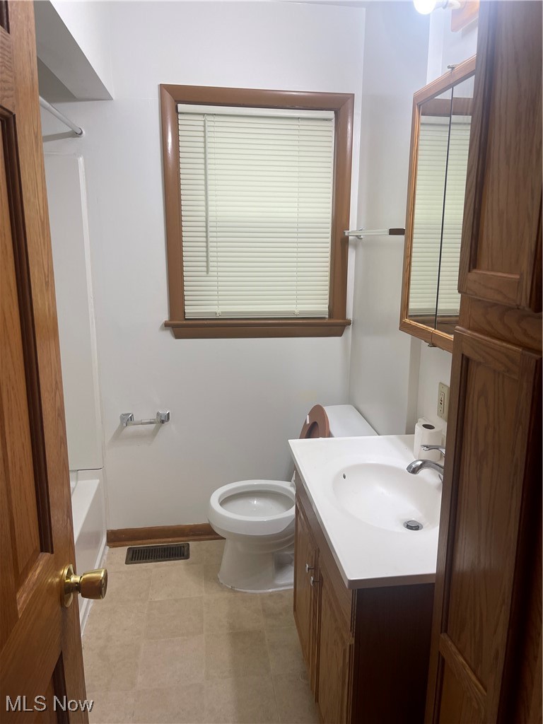 1881 17th Street Southwest Akron, OH 44314 - Photo 11 of 20 Full bath featuring vanity and shower / tub combination