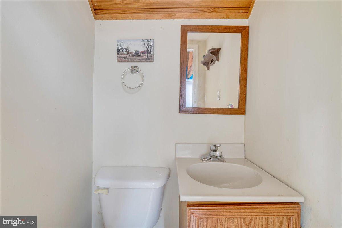 722 Foley Ridge Road Stuart, VA 24171 - Photo 38 of 67 Charming half-bath with rustic accents.