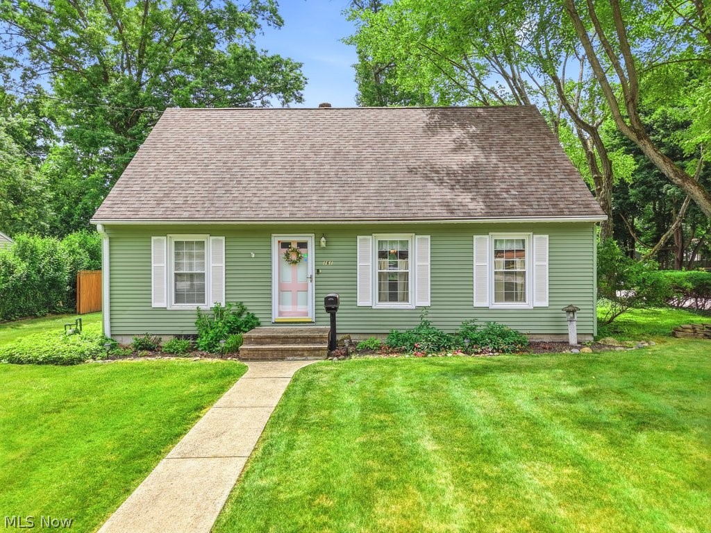 161 Pinehurst Road Munroe Falls, OH 44262 - Photo 1 of 40 Charming single-story residence with green horizontal siding
