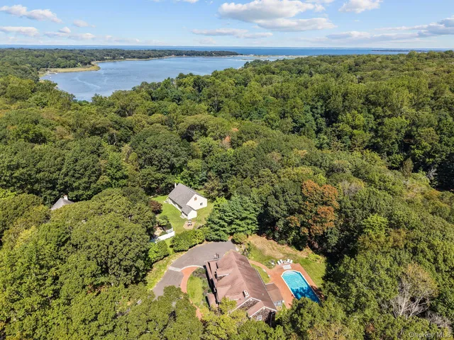 a view of a lake with a yard