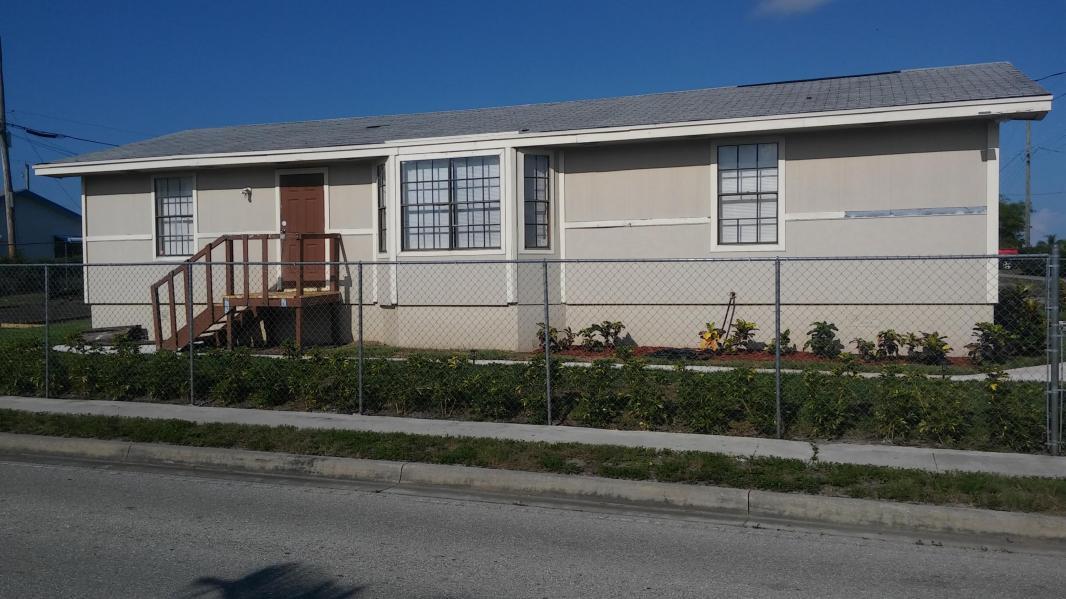 1496 West 31st Street Riviera Beach, FL 33404 - Photo 1 of 14 Front