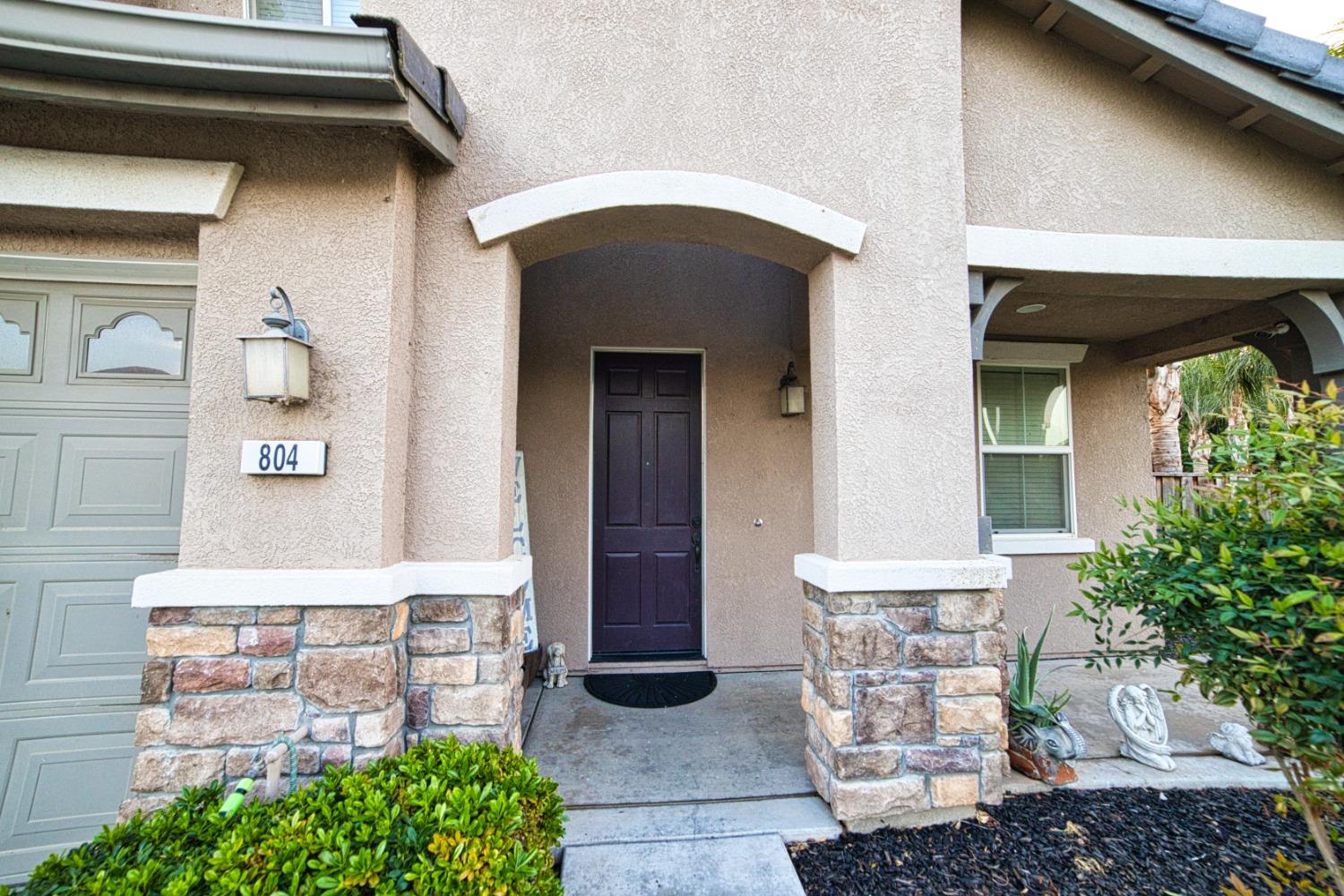 804 Pear Street Madera, CA 93638 - Photo 2 of 27 a view of front door of house