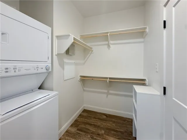a view of storage and utility room with washer and dryer
