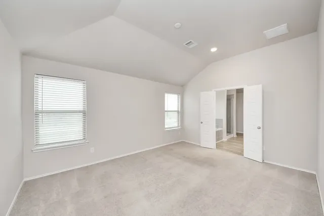 an empty room with windows