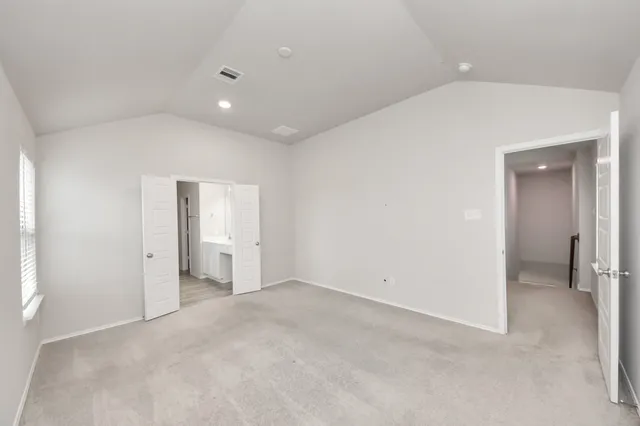 an empty room with windows