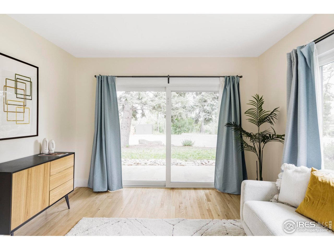 2085 Alpine Dr. Boulder, CO 80304 - Photo 11 of 23 a living room with furniture and a large window