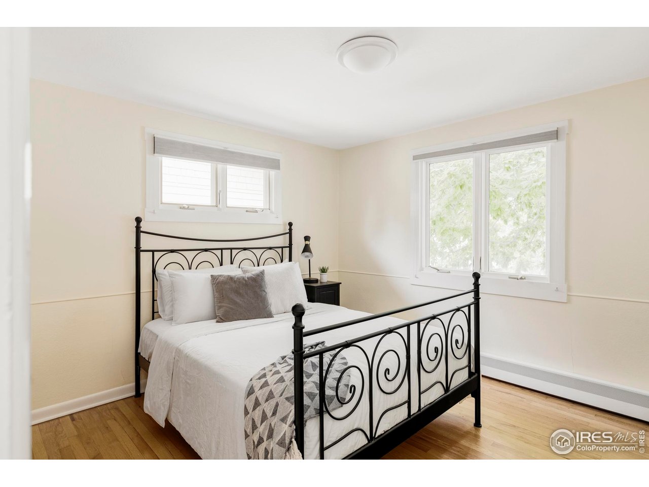 2085 Alpine Dr. Boulder, CO 80304 - Photo 20 of 23 a bedroom with a bed and a window