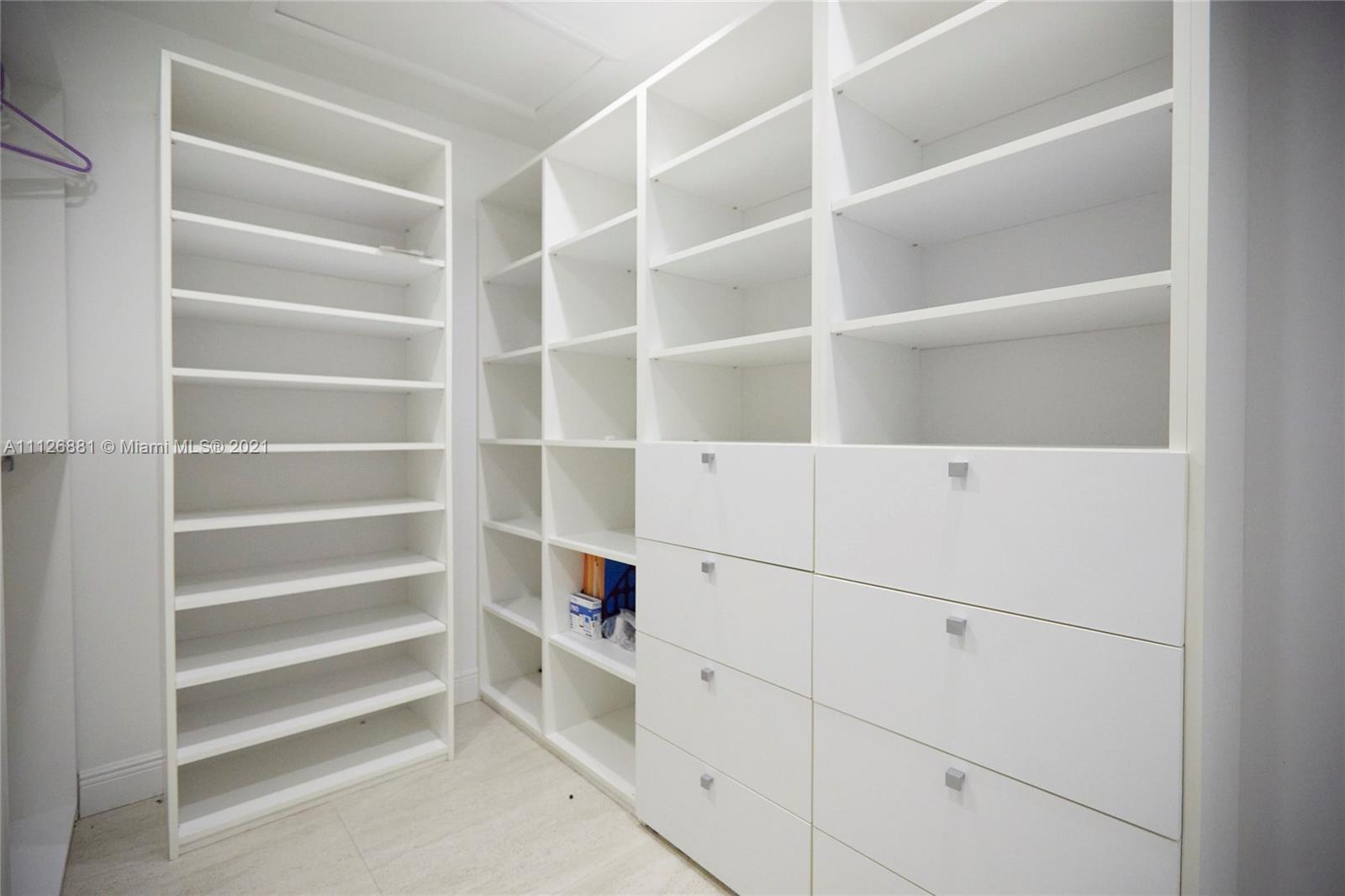 10726 Santa Rosa Drive Boca Raton, FL 33498 - Photo 19 of 26 a view of an empty walk in closet