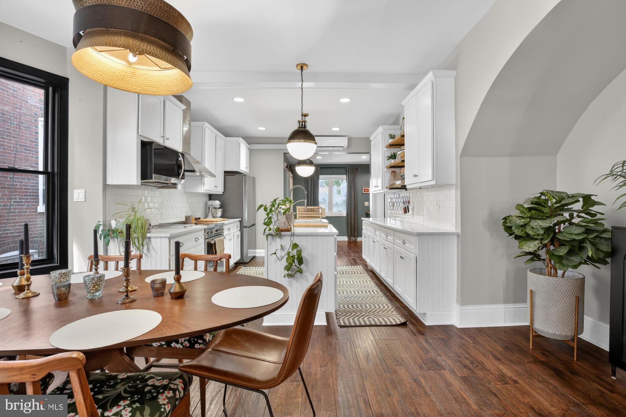 4315 Lauriston Street Philadelphia, PA 19128 - Photo 1 of 43 a dining room with furniture and wooden floor