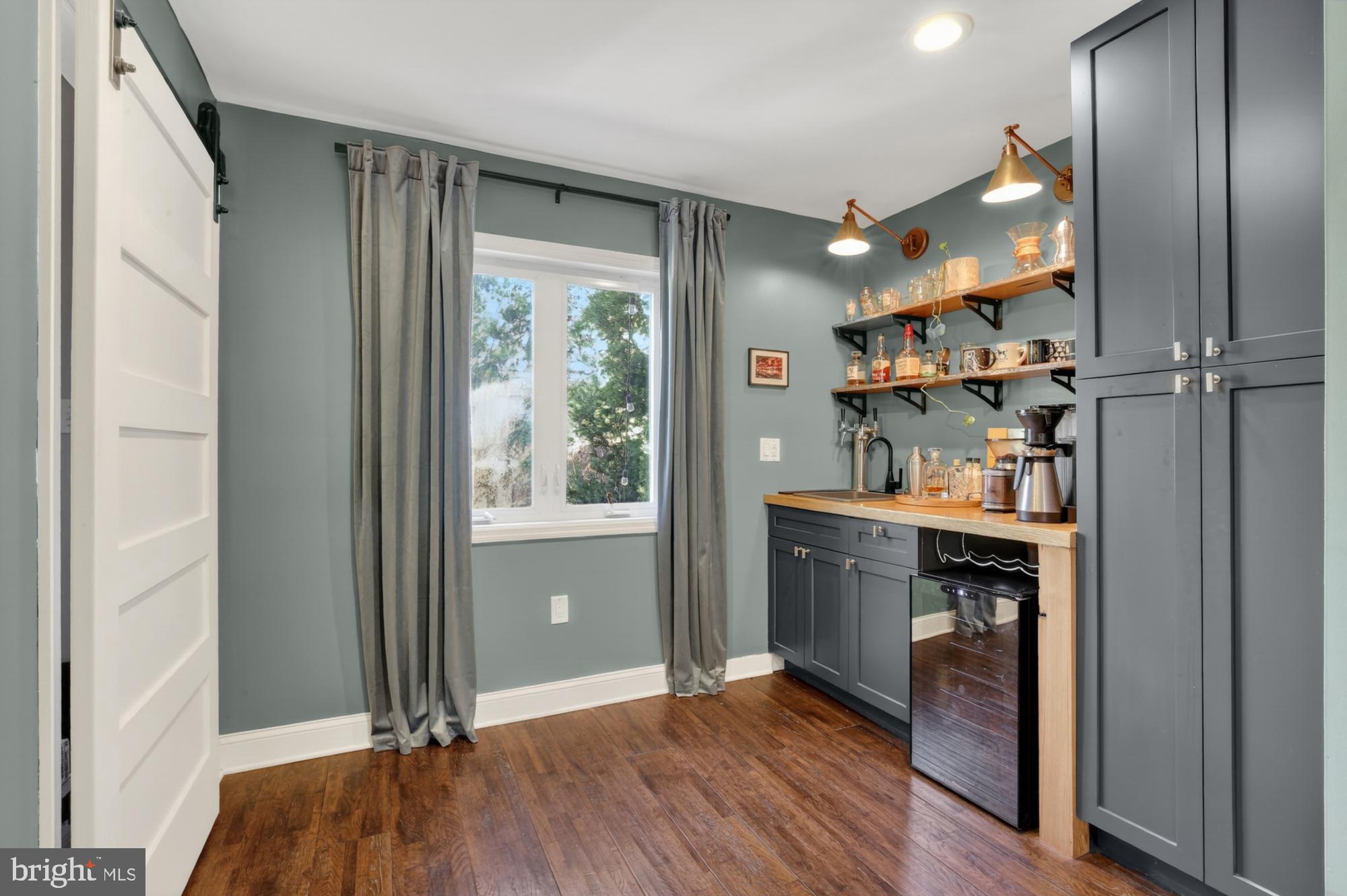 4315 Lauriston Street Philadelphia, PA 19128 - Photo 18 of 43 a view of a kitchen from a hallway