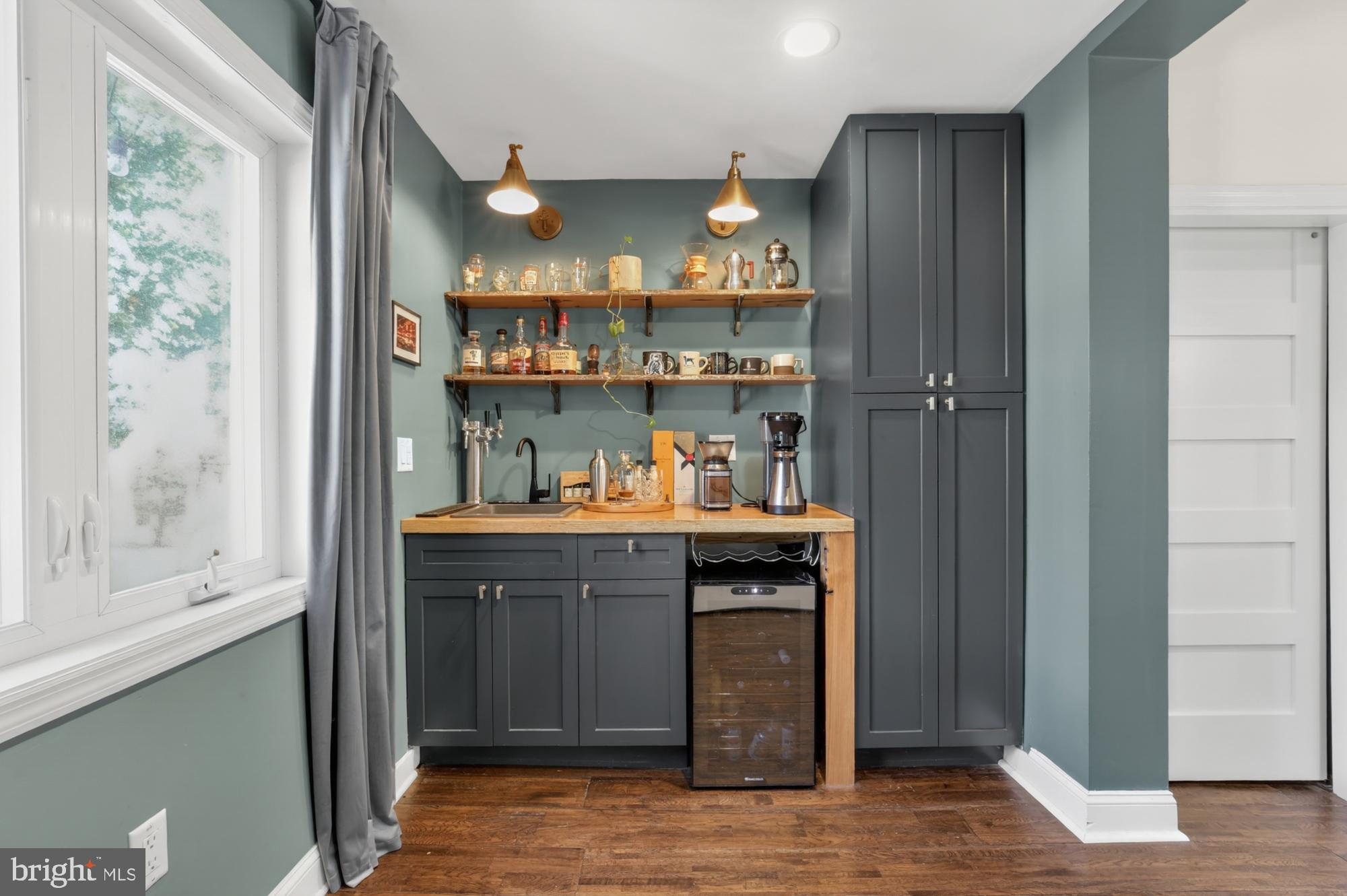 4315 Lauriston Street Philadelphia, PA 19128 - Photo 19 of 43 a kitchen with stainless steel appliances granite countertop a refrigerator and a sink