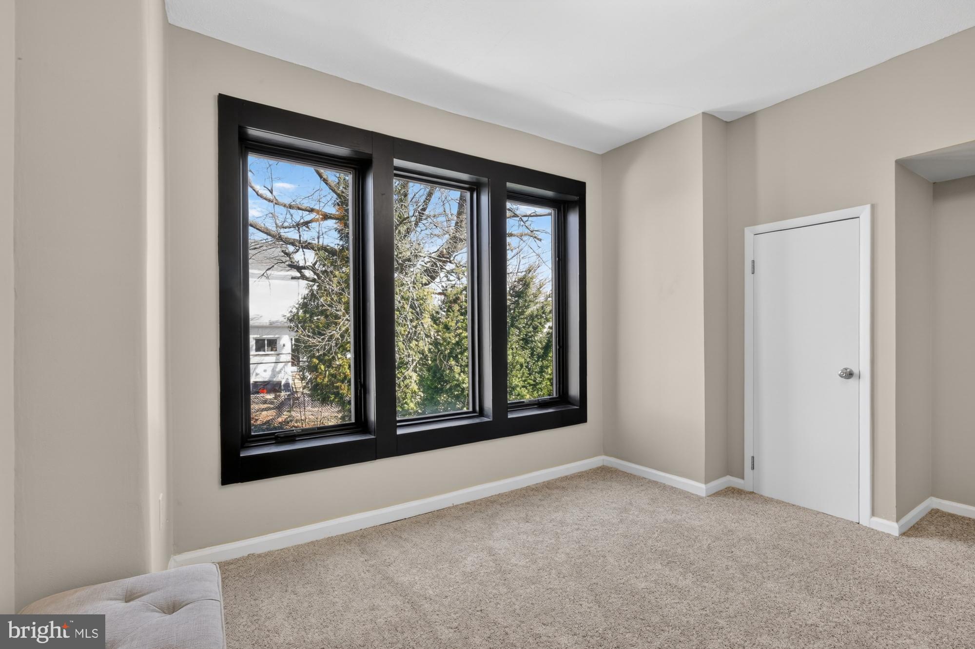 4315 Lauriston Street Philadelphia, PA 19128 - Photo 23 of 43 a view of an empty room with a window