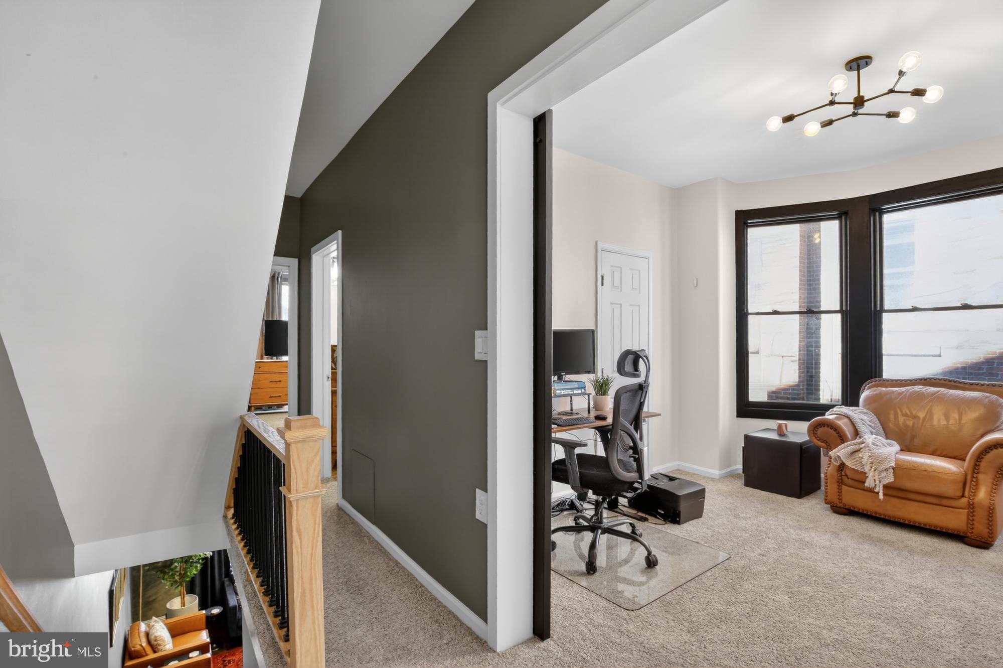 4315 Lauriston Street Philadelphia, PA 19128 - Photo 24 of 43 a view of a livingroom with furniture and a window