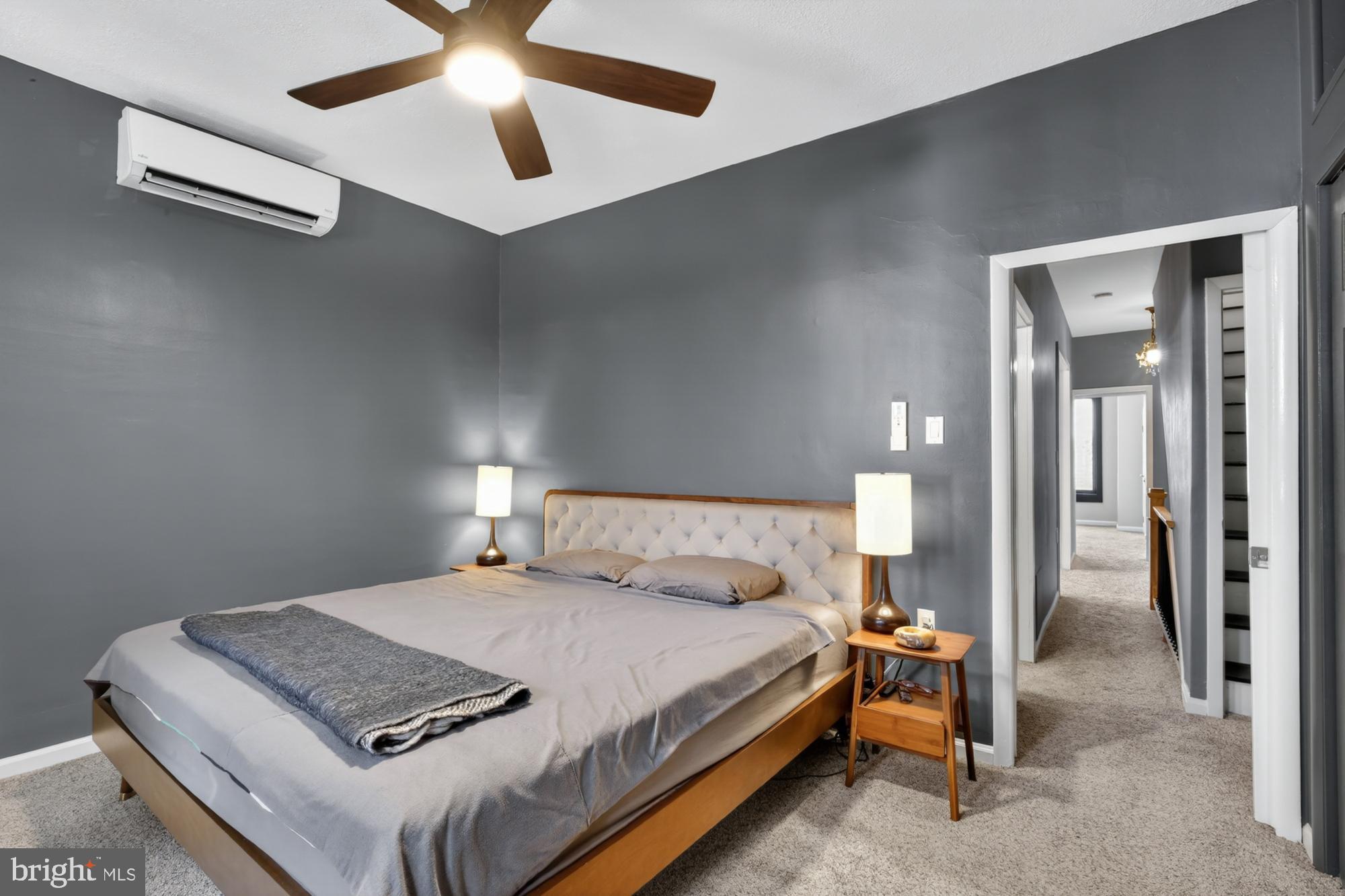 4315 Lauriston Street Philadelphia, PA 19128 - Photo 29 of 43 a bedroom with a bed and a lamp