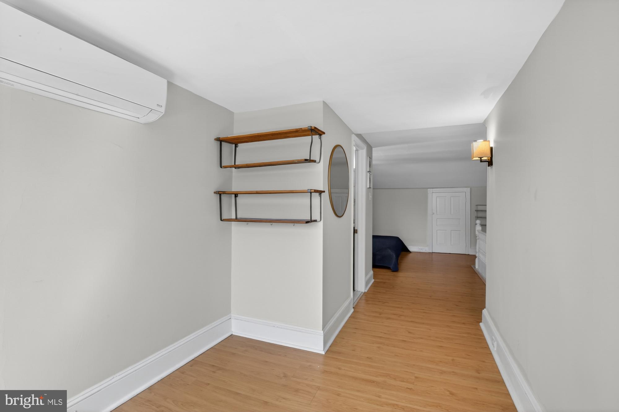 4315 Lauriston Street Philadelphia, PA 19128 - Photo 36 of 43 a view of a hallway with wooden floor and closet