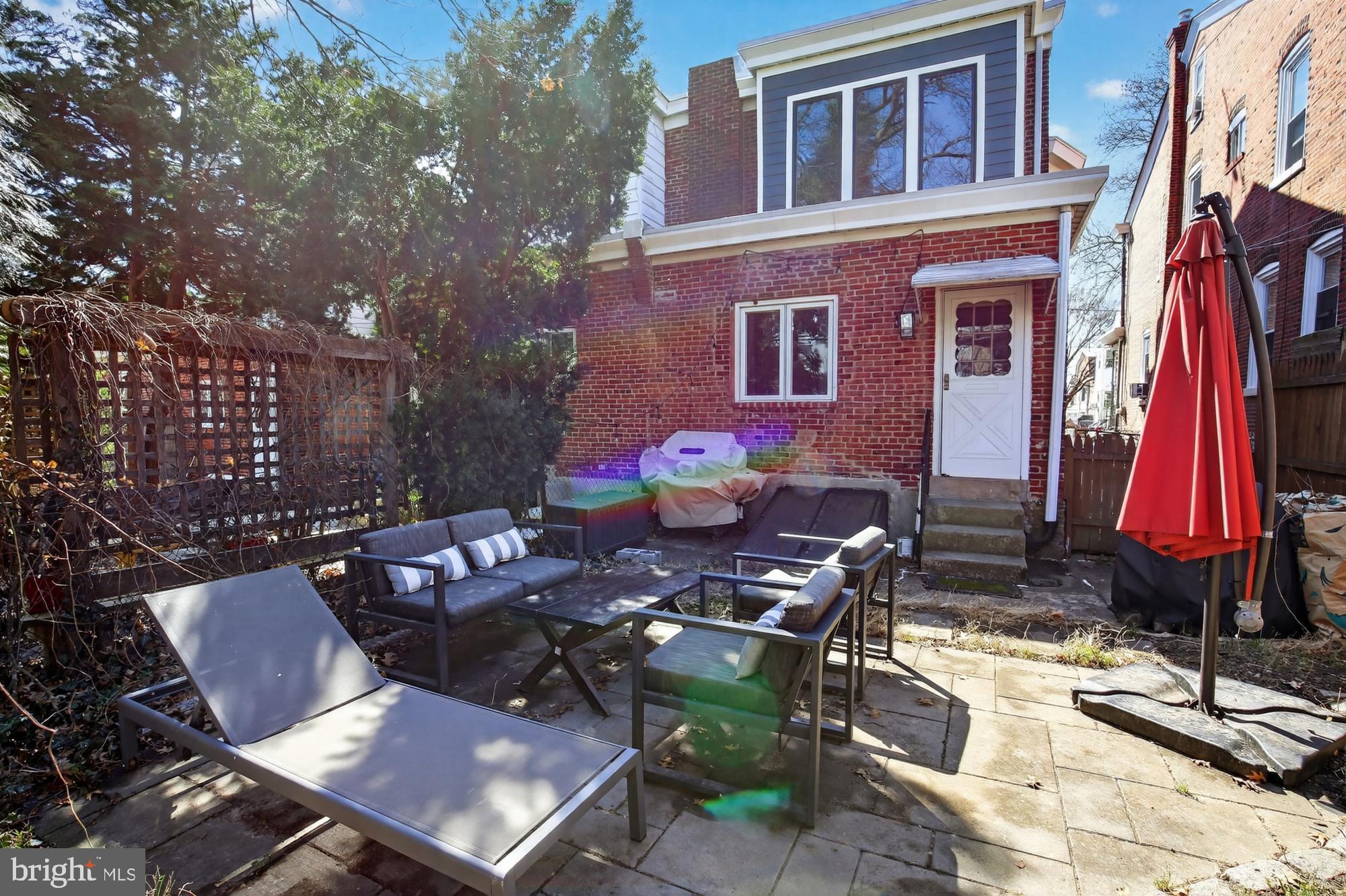 4315 Lauriston Street Philadelphia, PA 19128 - Photo 43 of 43 a front view of house with yard