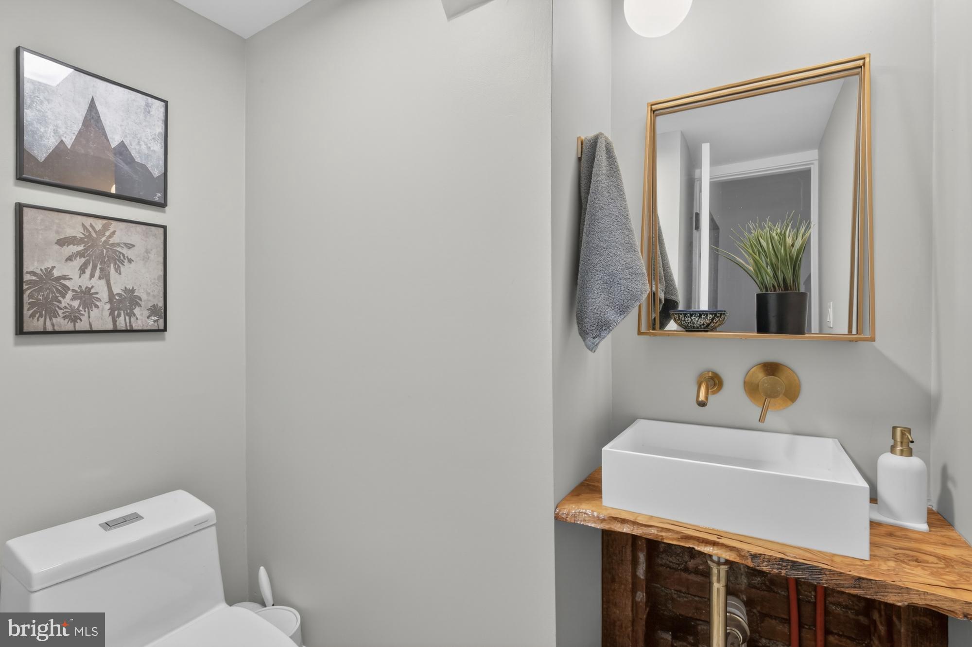 4315 Lauriston Street Philadelphia, PA 19128 - Photo 9 of 43 a bathroom with a sink vanity and toilet