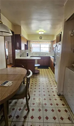 a living room with a couch and a rug