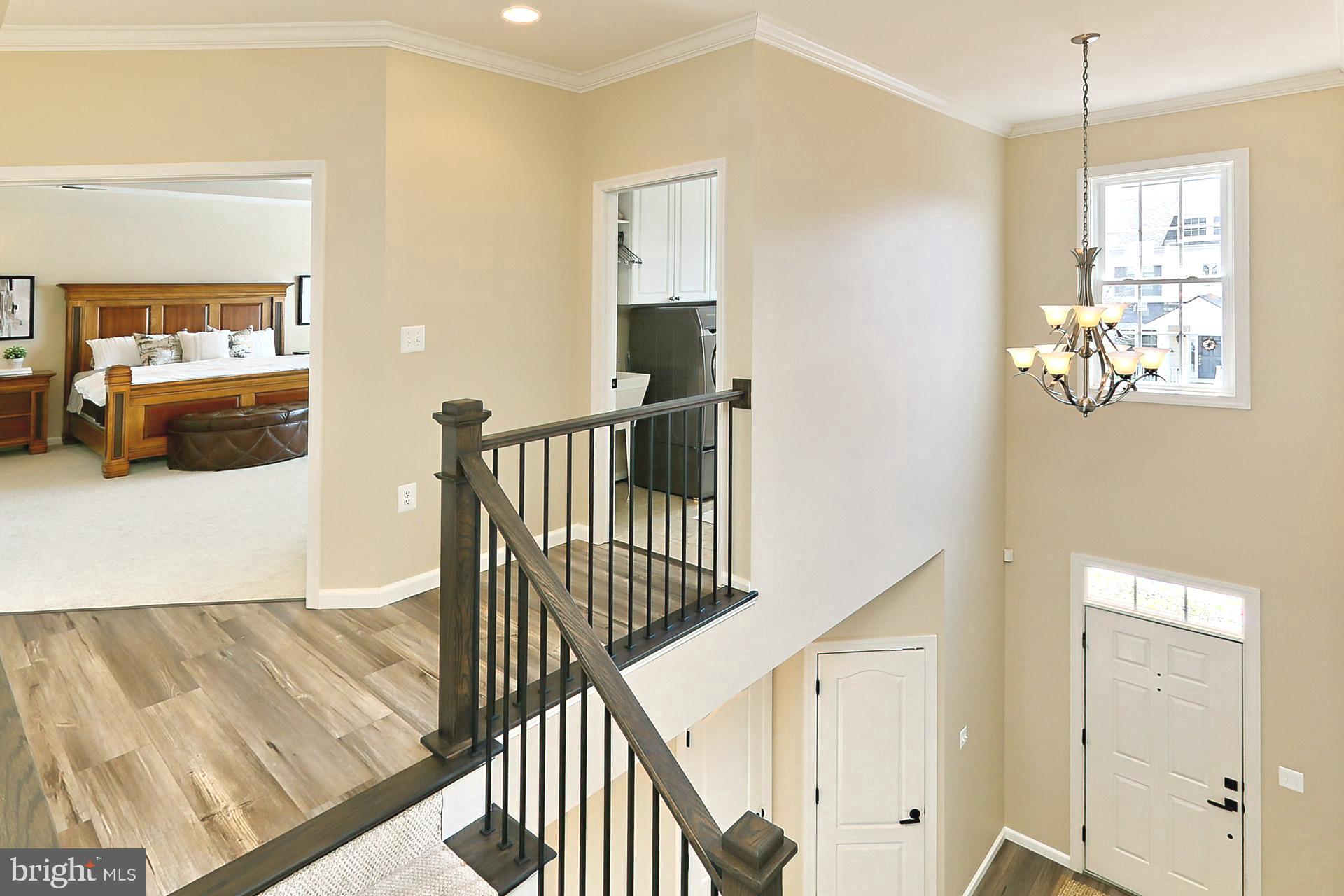 42440 Spring Splendor Drive Brambleton, VA 20148 - Photo 17 of 69 Upper Foyer with New Luxury Flooring
