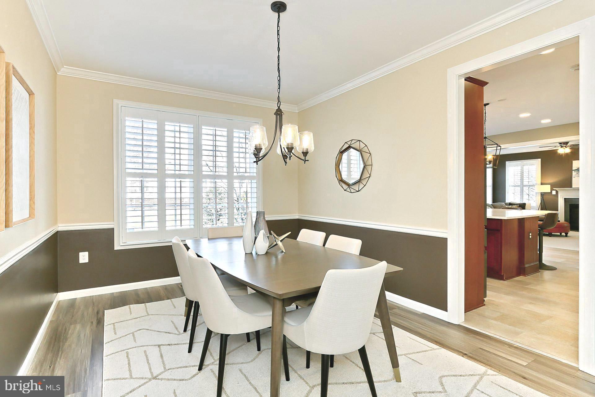 42440 Spring Splendor Drive Brambleton, VA 20148 - Photo 9 of 69 Formal Dining Room with New Luxury Flooring