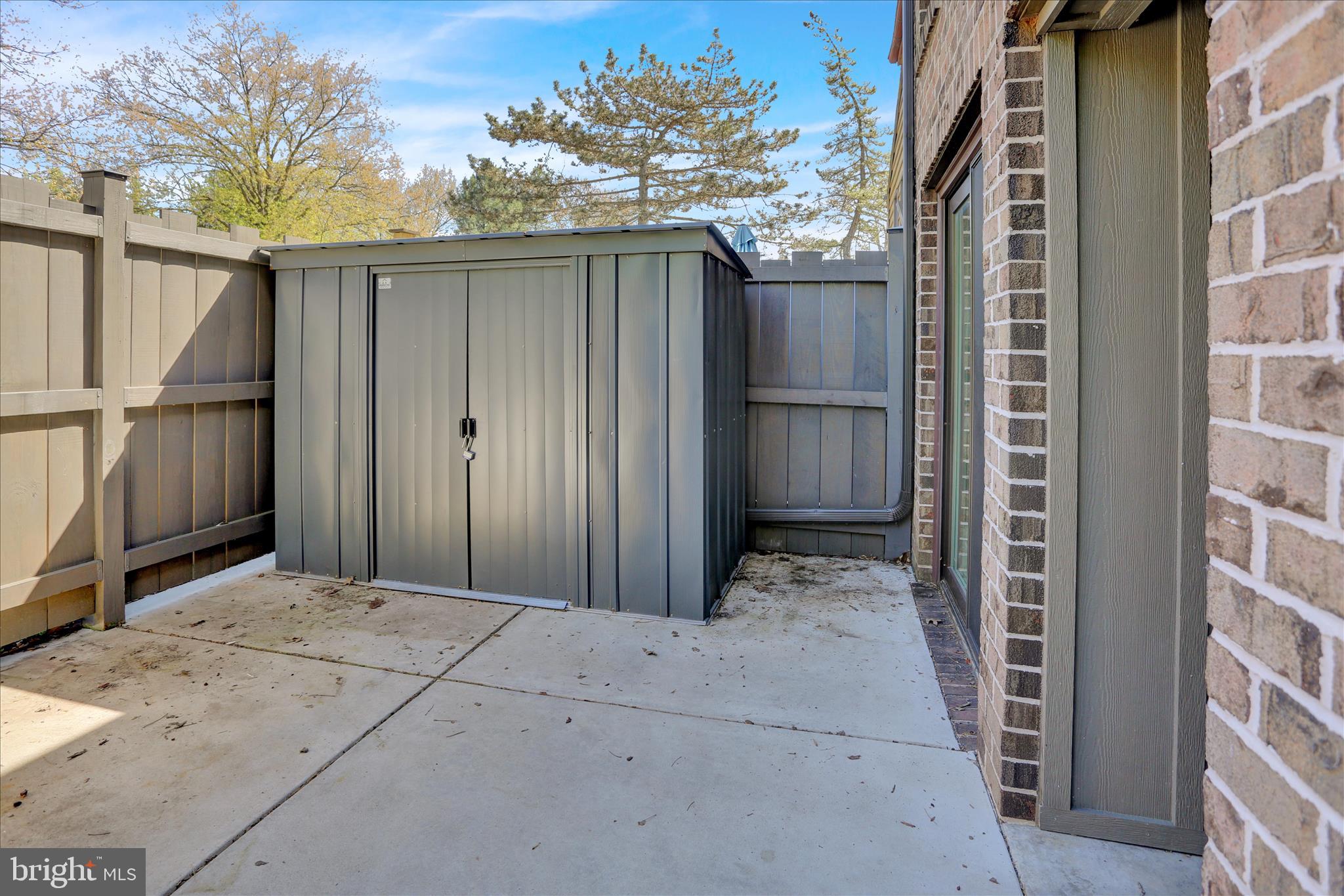 71 Burning Tree Lane Reading, PA 19607 - Photo 26 of 31 Patio with storage shed