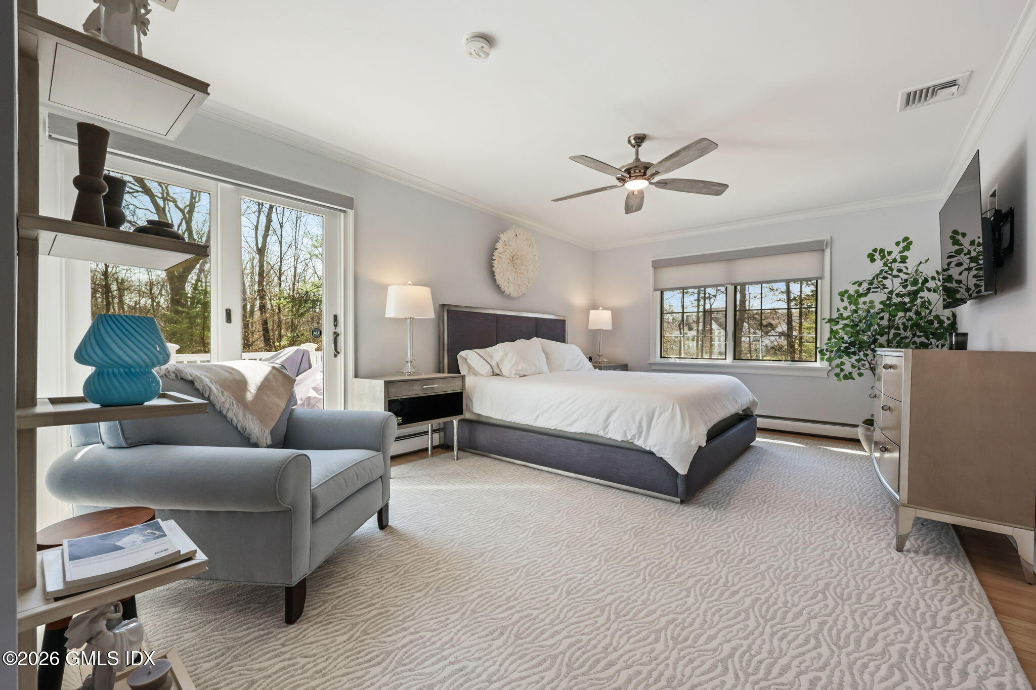 97 Davenport Ridge Lane Stamford, CT 06903 - Photo 15 of 31 a bedroom with a bed couches and a flat tv screen