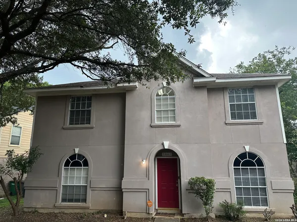 a front view of house with yard