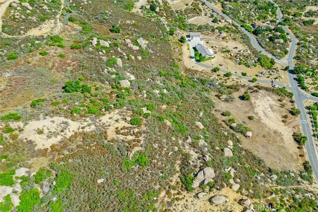 a view of a city with mountains in the background