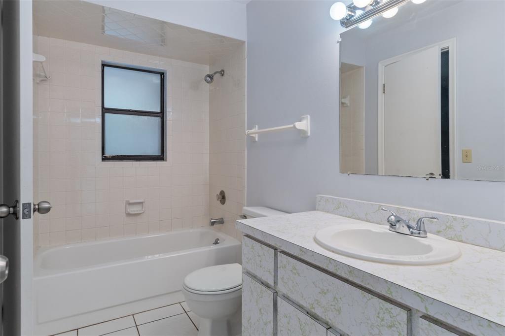 72 Chinaberry Circle Homosassa, FL 34446 - Photo 27 of 56 a bathroom with a granite countertop sink toilet and shower