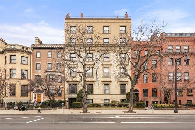 a view of a building with a street