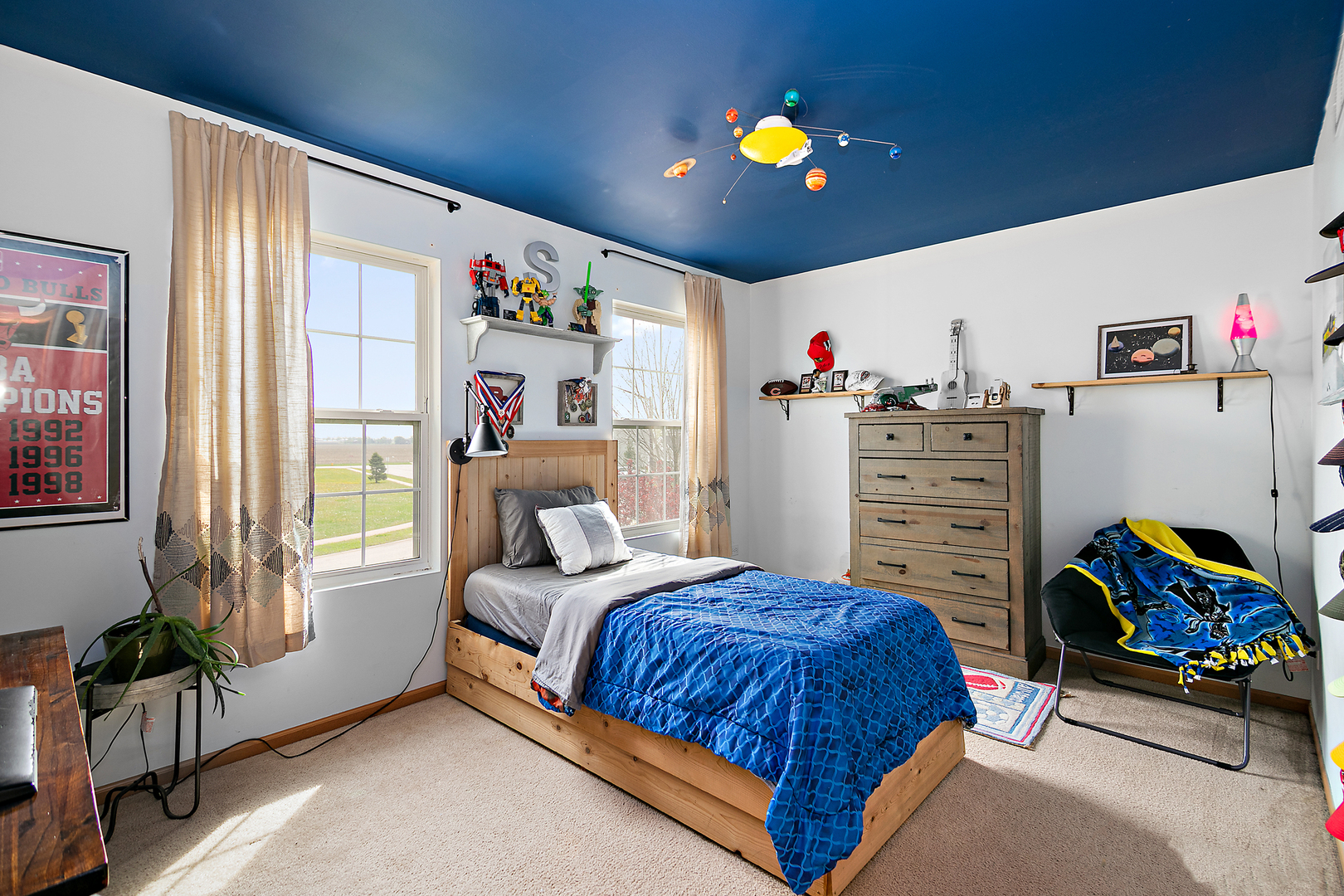 2256 Swallowtail Street Bourbonnais, IL 60914 - Photo 19 of 29 a bedroom with a bed and a window