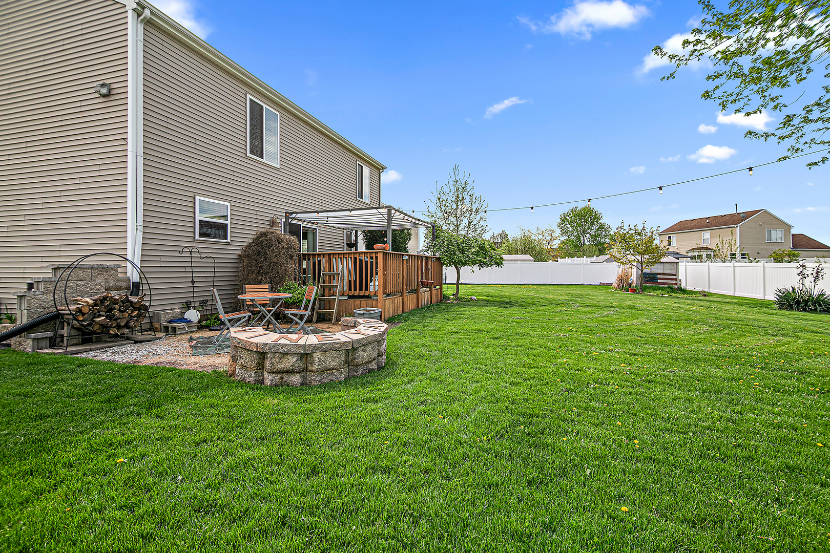 2256 Swallowtail Street Bourbonnais, IL 60914 - Photo 27 of 29 a front view of a house with garden and sitting area