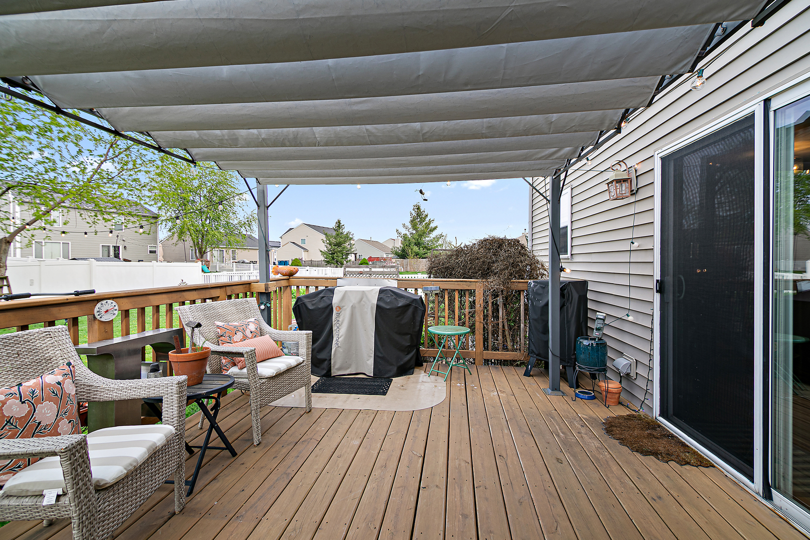 2256 Swallowtail Street Bourbonnais, IL 60914 - Photo 10 of 29 a balcony with furniture and wooden floor