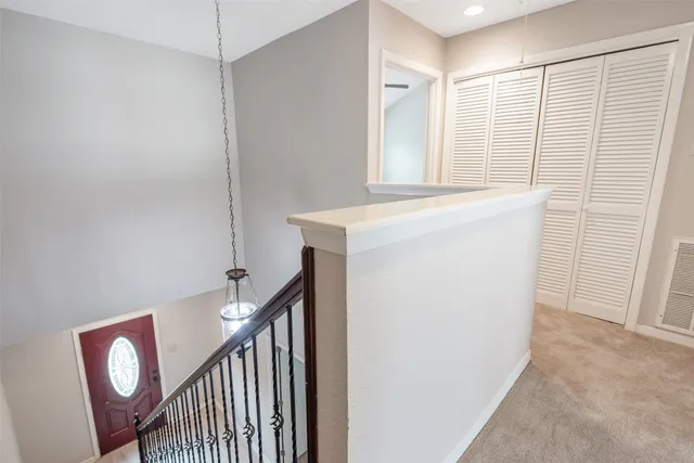 a view of a hallway with entryway