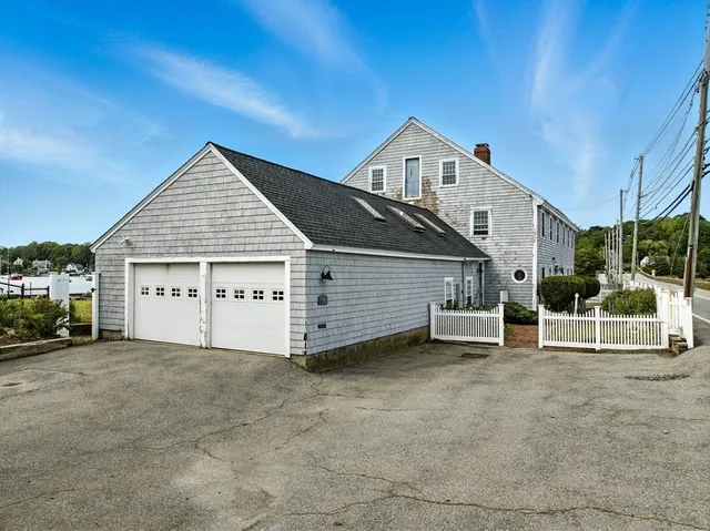 a view of a house with a garage