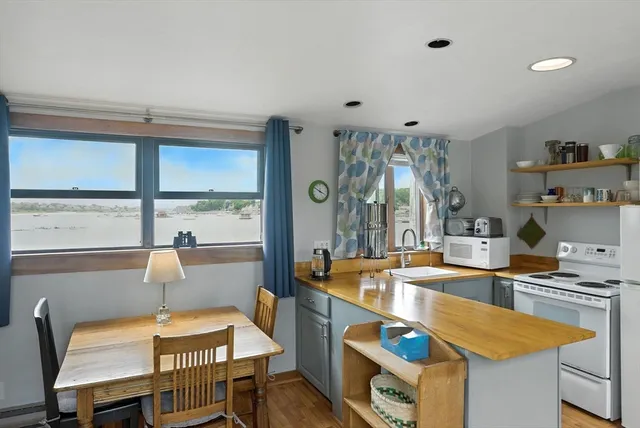 a view of a terrace with chairs