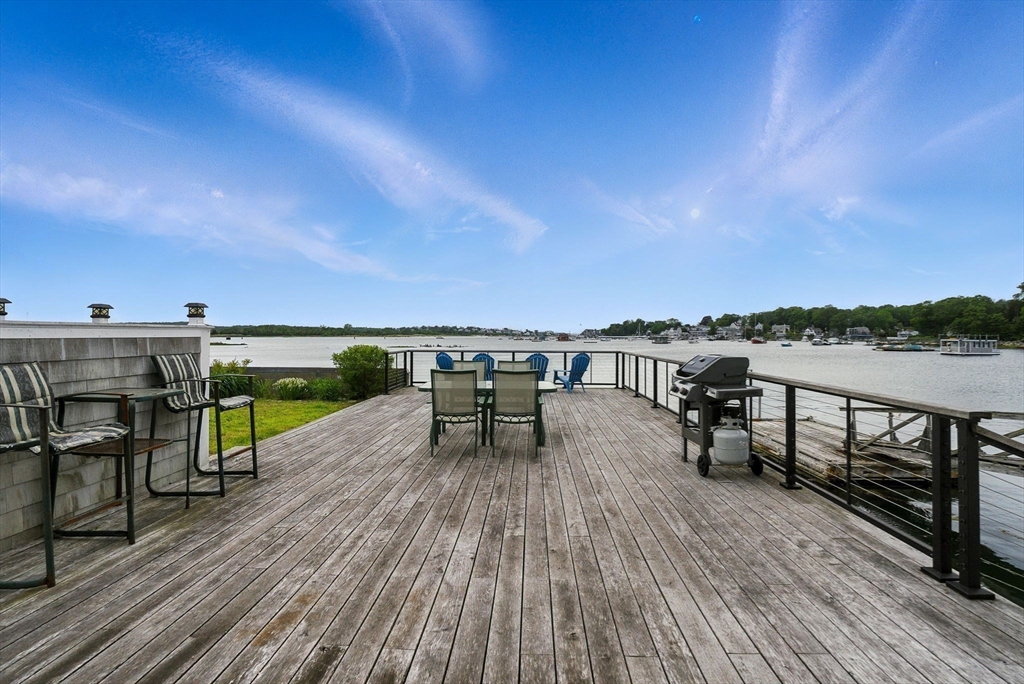 672 Washington Street Gloucester, MA 01930 - Photo 24 of 27 a view of a terrace with chairs