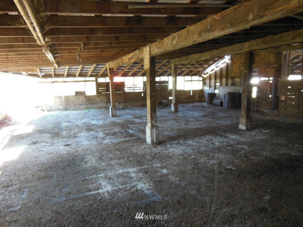 28408 Fern Bluff Road Monroe, WA 98272 - Photo 12 of 22 a view of a empty room with wooden roof