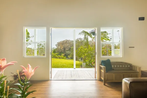 a living room with furniture and a large window