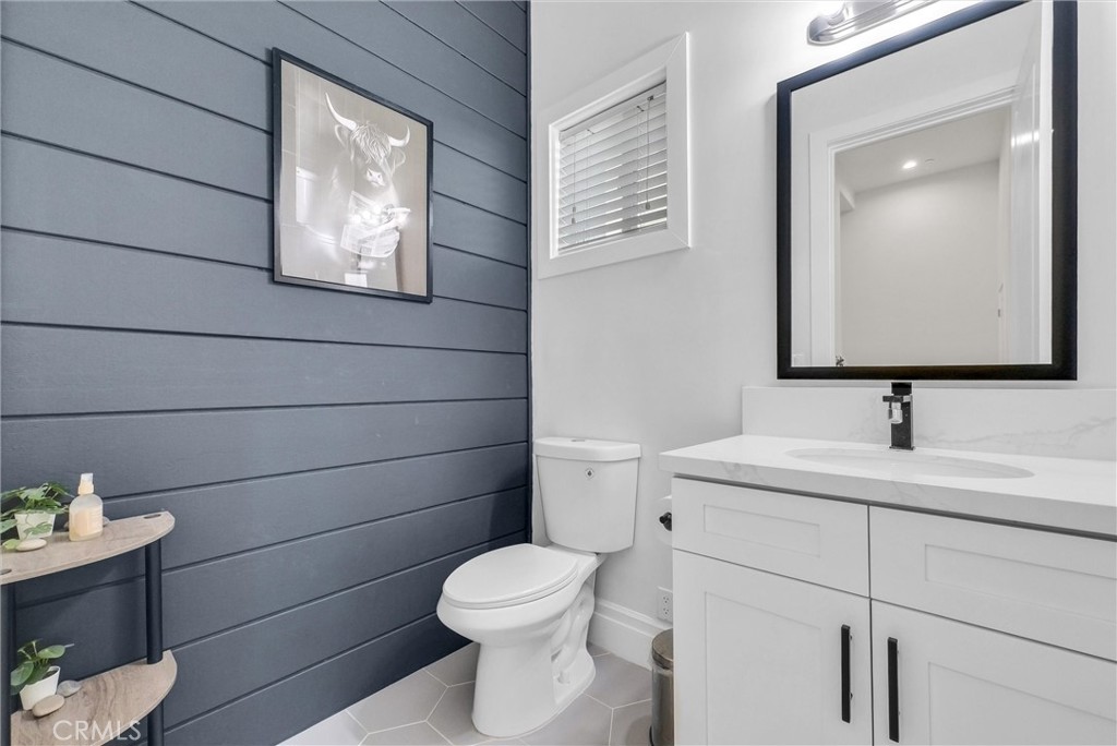 451 Avenida Esplendor Walnut, CA 91789 - Photo 11 of 51 a bathroom with a toilet sink vanity and mirror