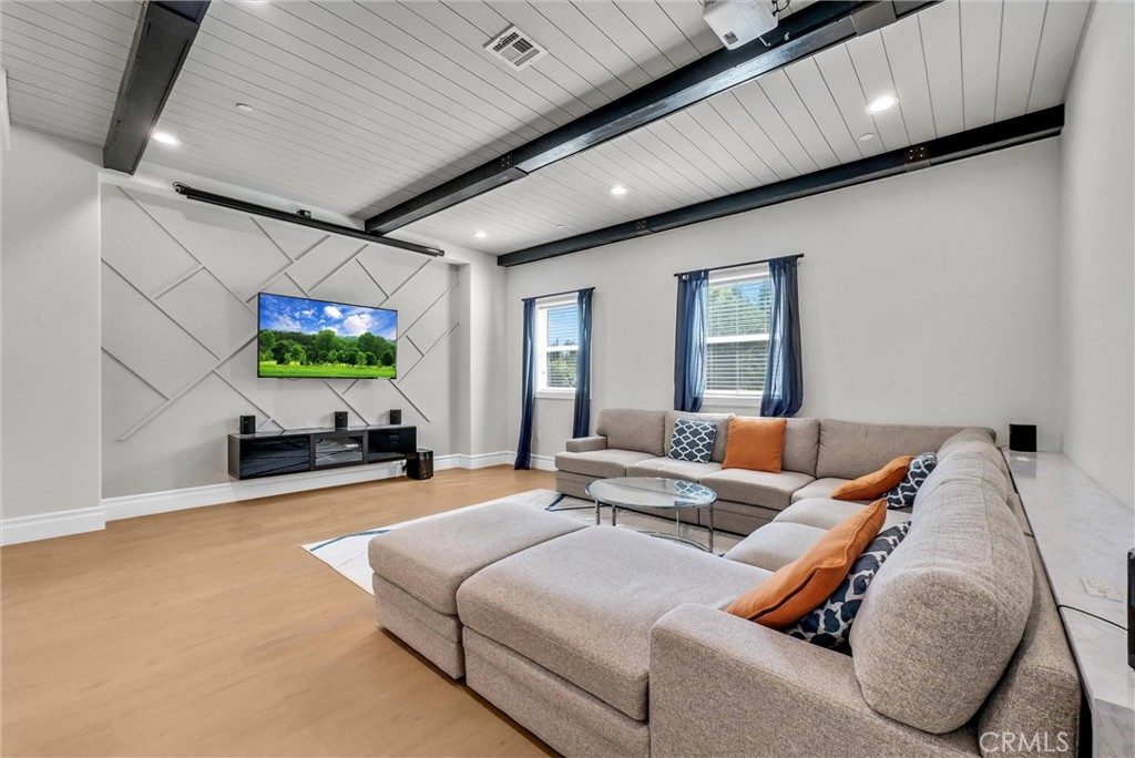 451 Avenida Esplendor Walnut, CA 91789 - Photo 16 of 51 a living room with furniture and a flat screen tv