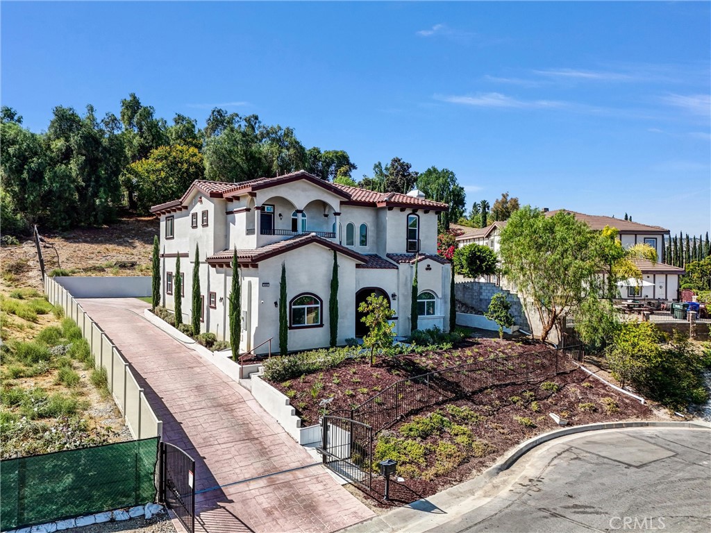 451 Avenida Esplendor Walnut, CA 91789 - Photo 2 of 51 a front view of a house with a yard