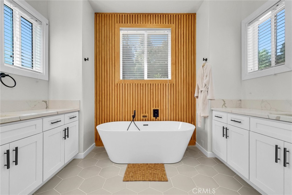 451 Avenida Esplendor Walnut, CA 91789 - Photo 30 of 51 a spacious bathroom with a double vanity sink mirror and a bathtub