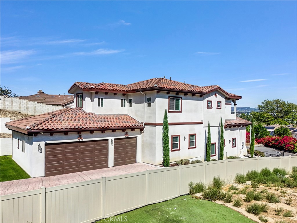 451 Avenida Esplendor Walnut, CA 91789 - Photo 3 of 51 a front view of a house with a yard