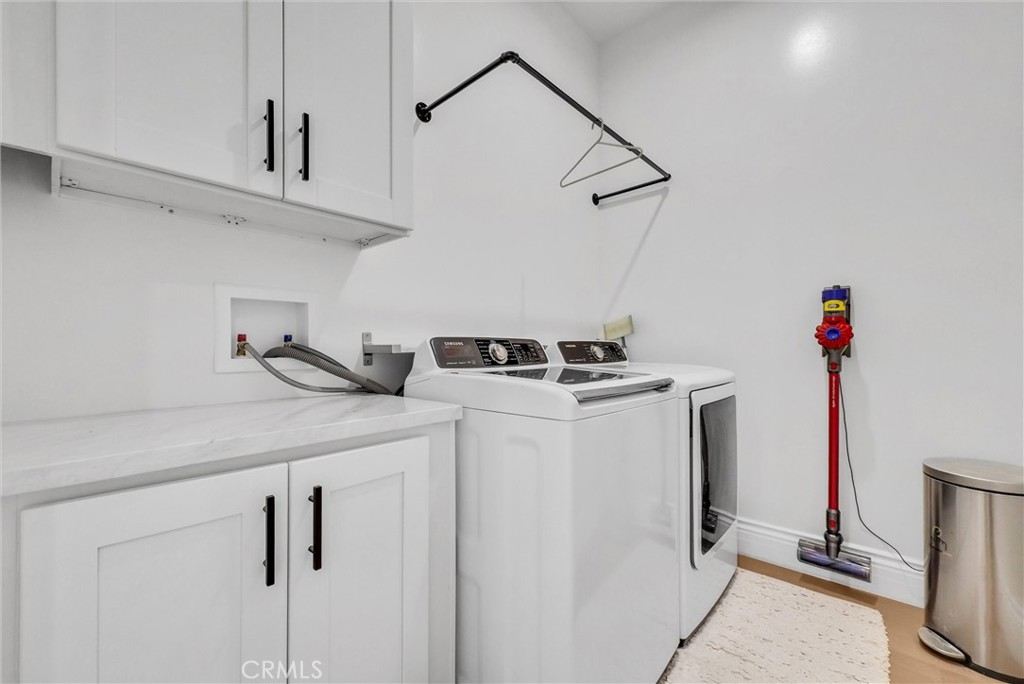 451 Avenida Esplendor Walnut, CA 91789 - Photo 33 of 51 a utility room with dryer and white door