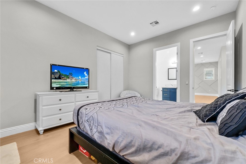 451 Avenida Esplendor Walnut, CA 91789 - Photo 35 of 51 a bedroom with a bed and a flat screen tv